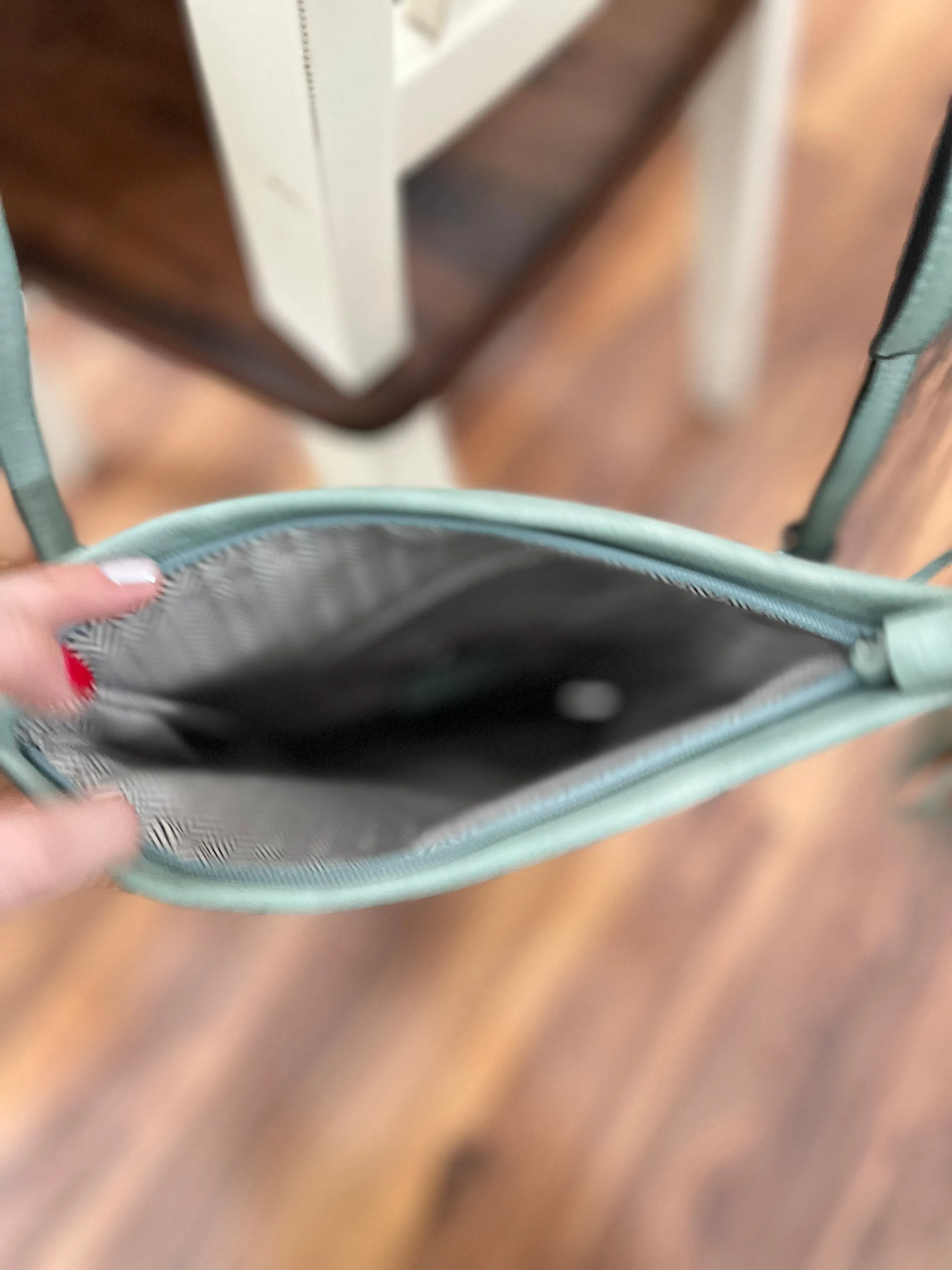 Austin Tassle Flapover Crossbody in Light Teal